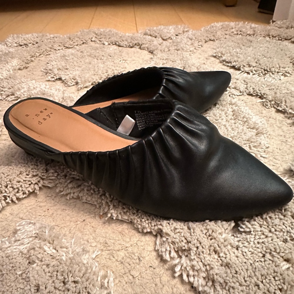Black leather mules
